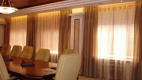 Modern office curtains in Dubai, designed for privacy, light control, and a professional ambiance in work environments.