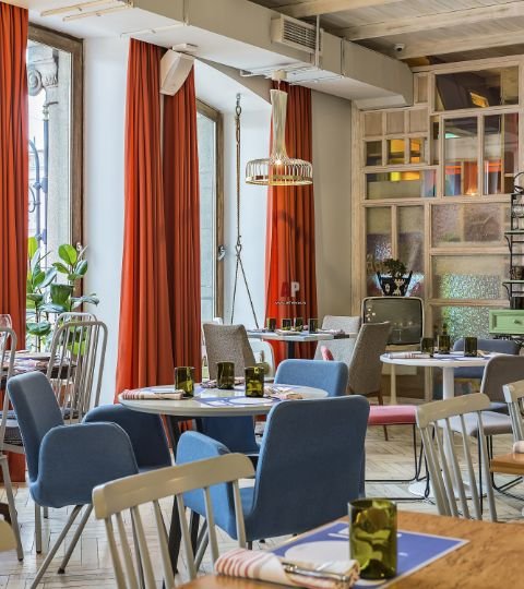 Stylish restaurant curtains providing privacy and ambiance for dining areas in Dubai.